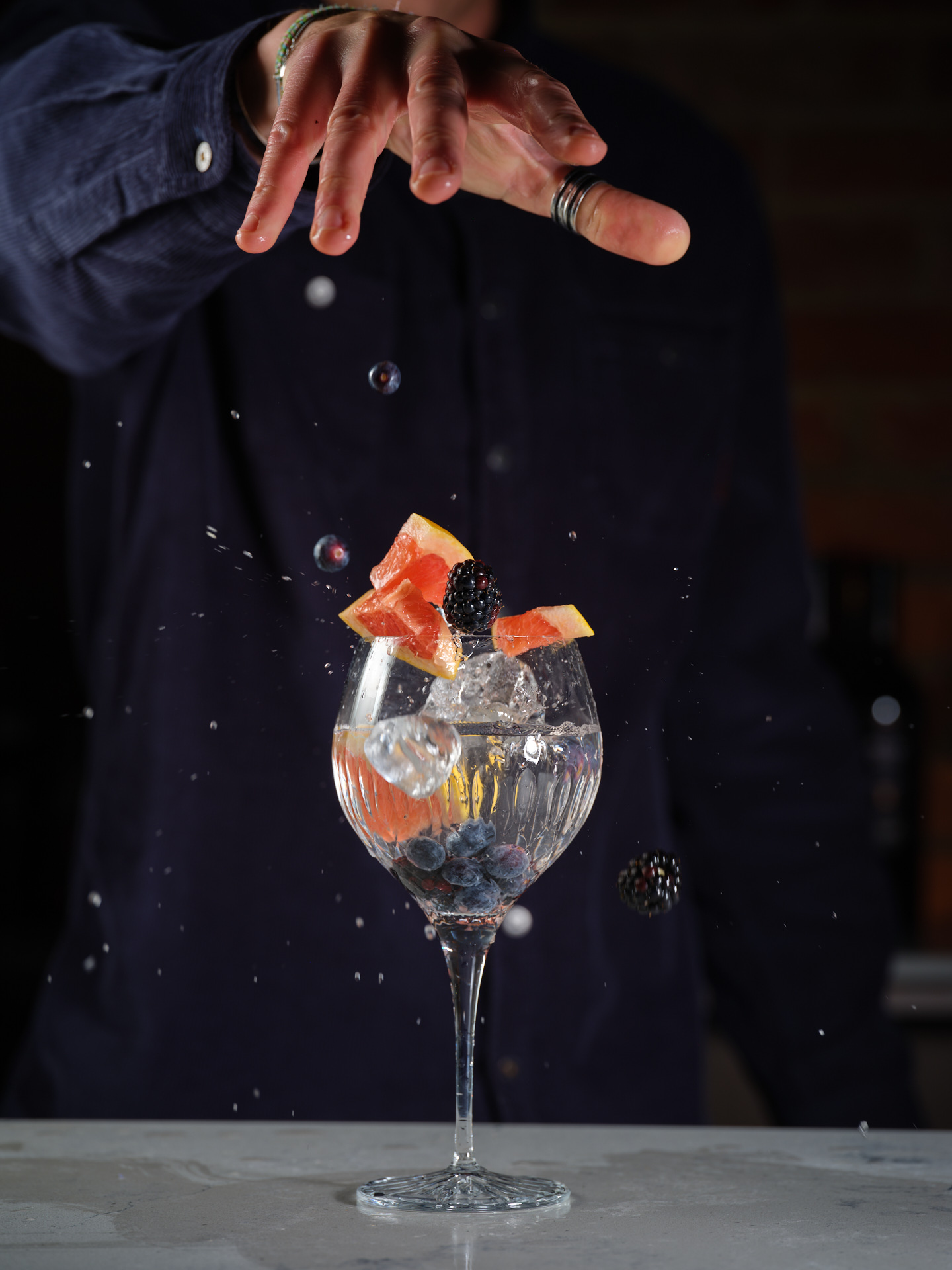 Casual Dining | An image of someone making a delicious Stanwell cocktail